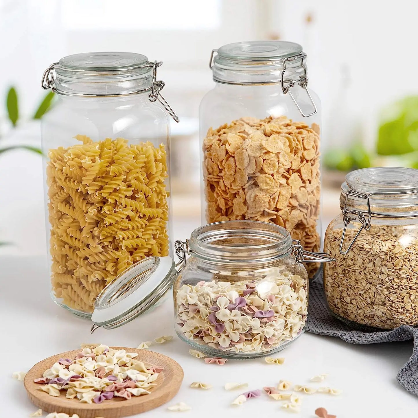 Glass storage jar with airtight clamp lid